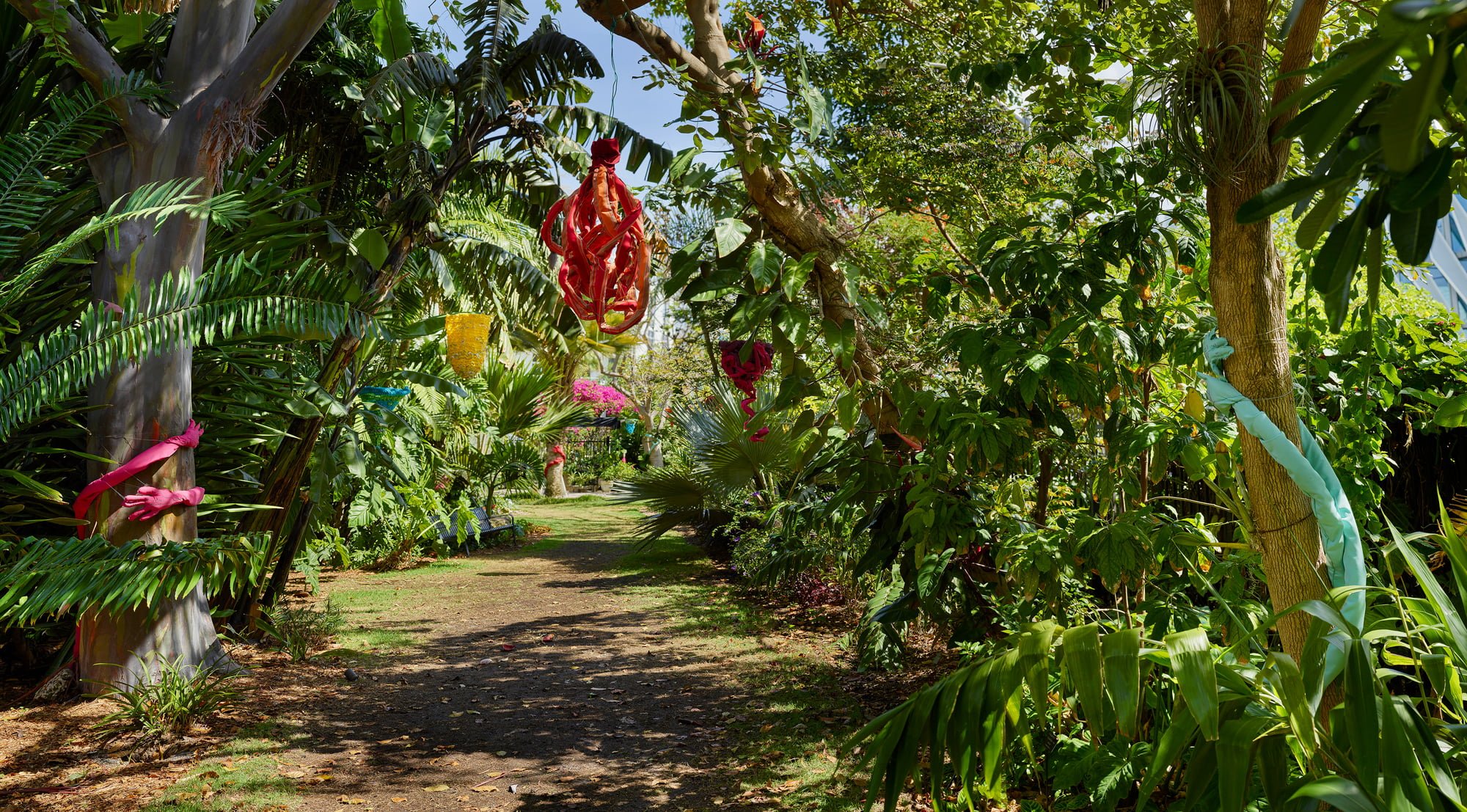 "Tree Huggers and Nests. The Art of Evelyn Politzer" 2022. Miami Beach Botanical Garden. Miami Beach, FL.  Sculptures were made with outdoor fabric. Hand embroidered